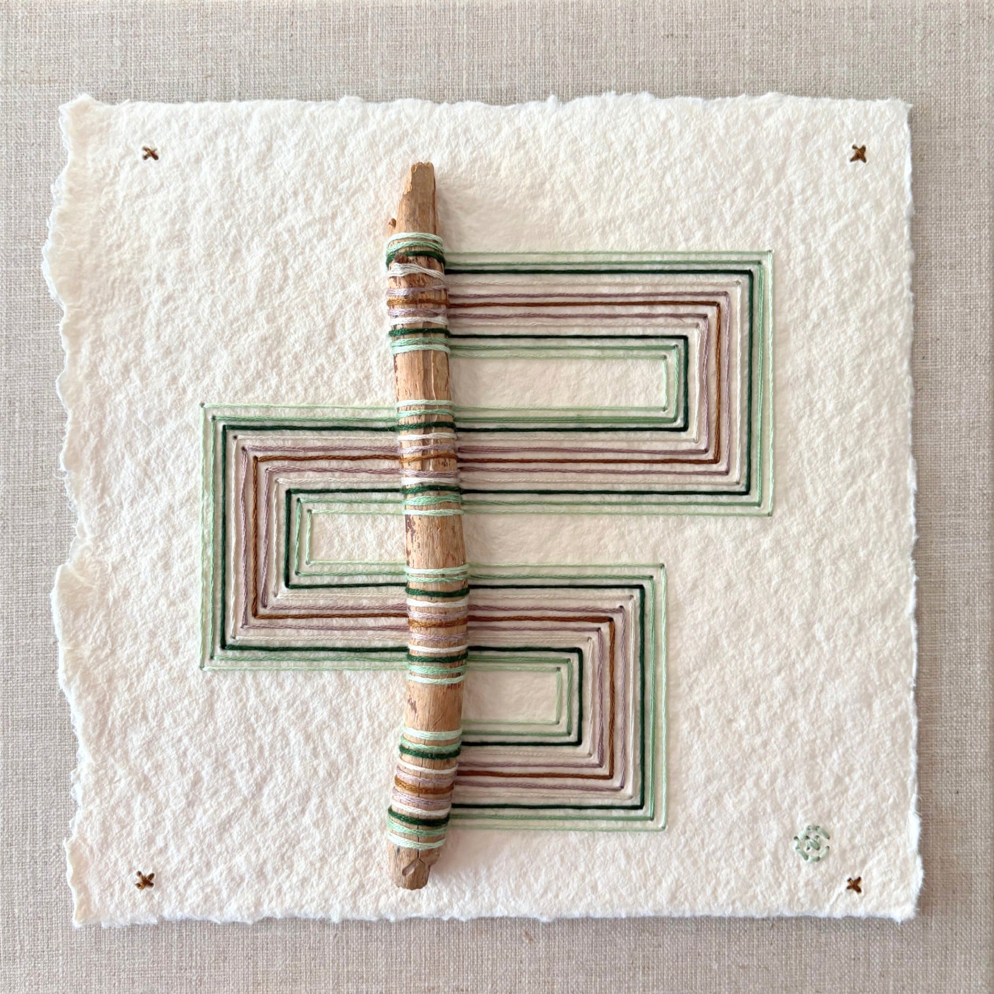 Nesting #368 by Natalie Ciccoricco, wooden stick and thread on handmade paper