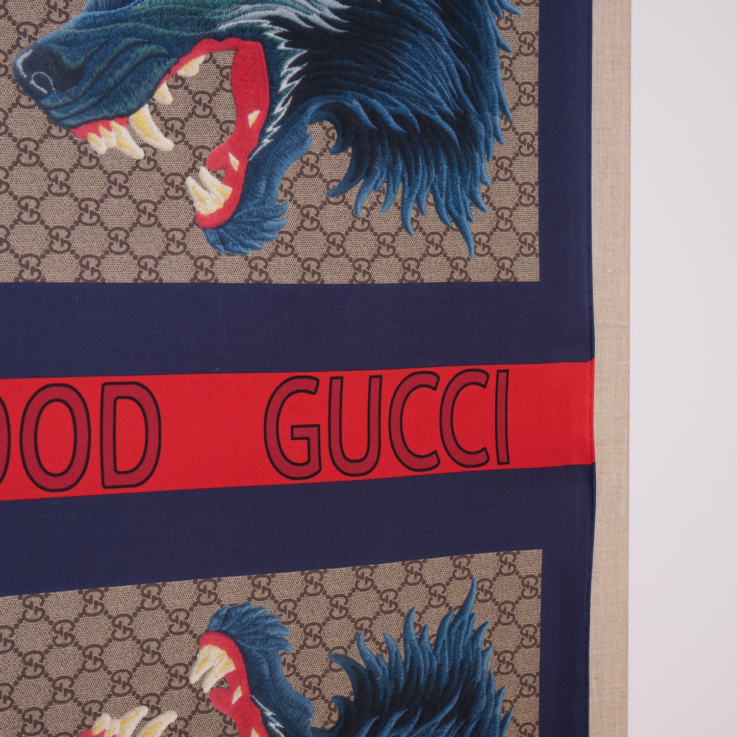 Framed Gucci Monogram XXV Hollywood Wolf Web Silk Scarf in a 36x36x2" Shadowbox