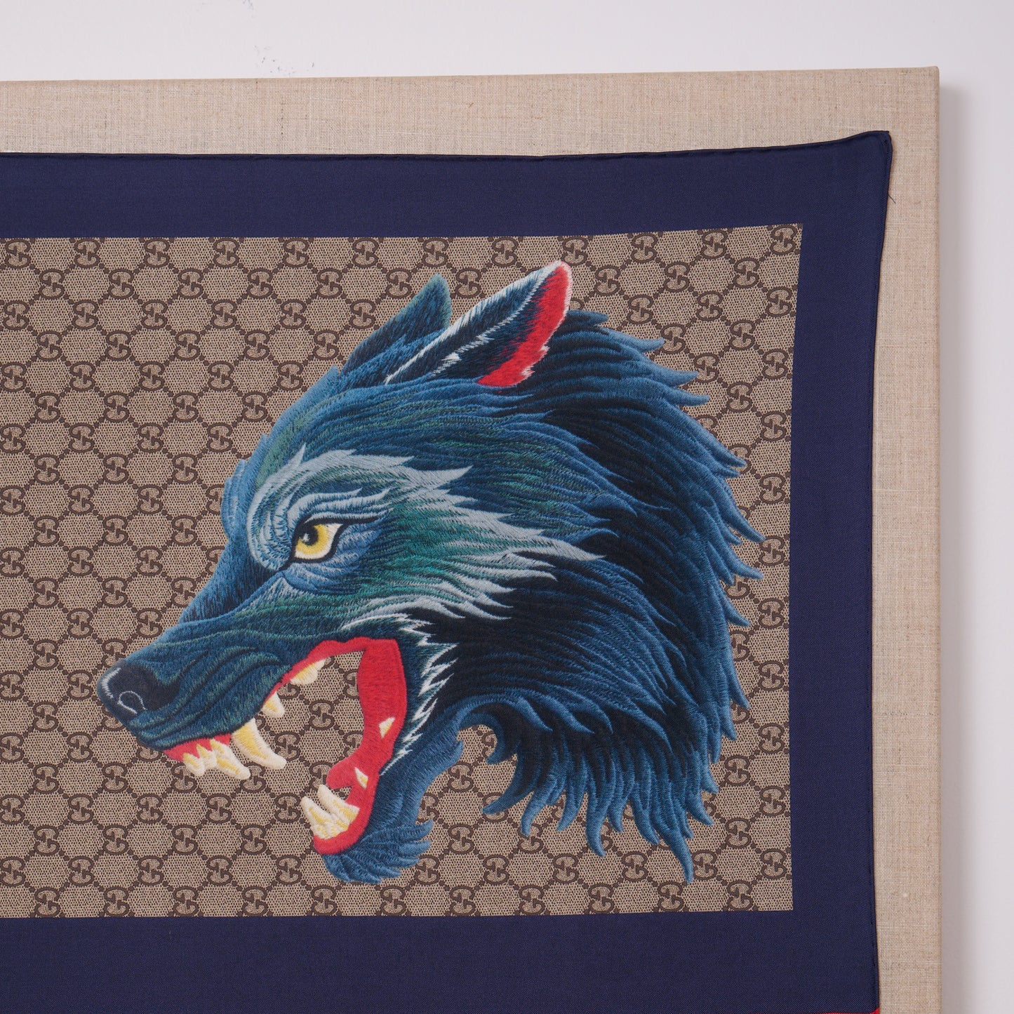 Framed Gucci Monogram XXV Hollywood Wolf Web Silk Scarf in a 36x36x2" Shadowbox