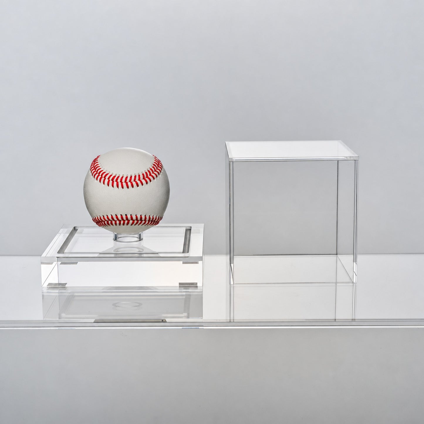 Baseball display case with the clear acrylic cover lifted off, showing tool-free access to the baseball